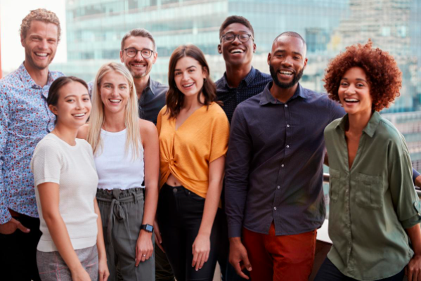 8 People Smiling for the Camera